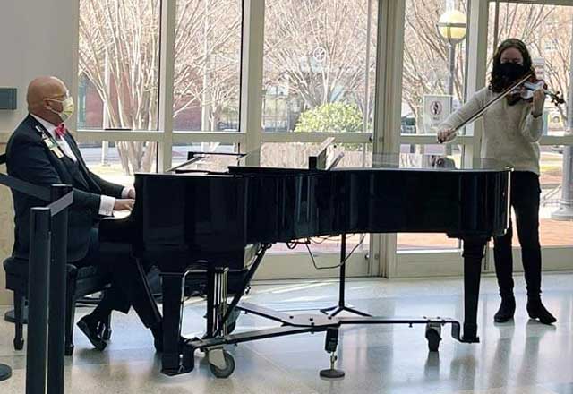 Musicians performing at Johns Hopkins Hospital